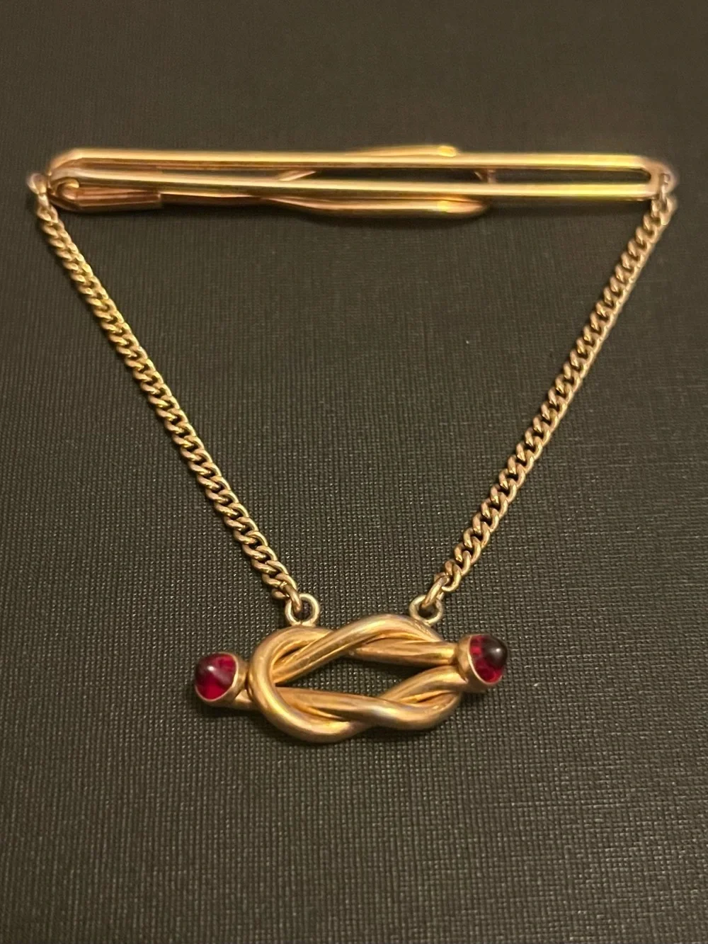 Vintage Swank gold ruby tie bar clip cuff links set